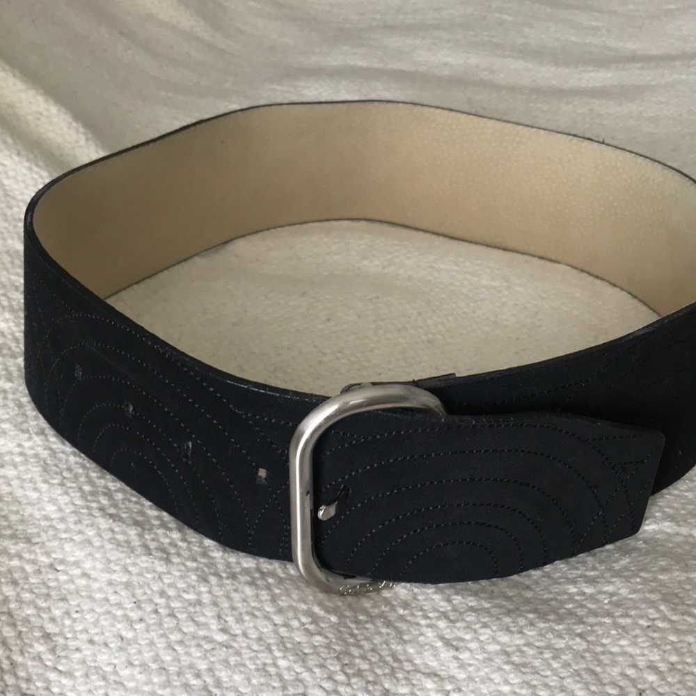 A Calvin Klein black suede belt. Size small. EUC 35” long